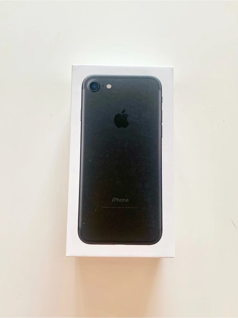 Empty iPhone 7 Box and Apple Stickers